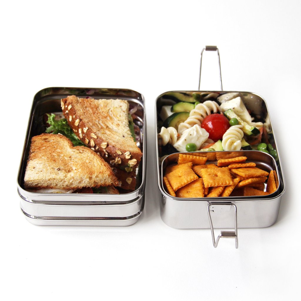 Say goodbye to plastic baggies and other leachy plastic food containers with the stainless steel ECOlunchbox Three-in-One.