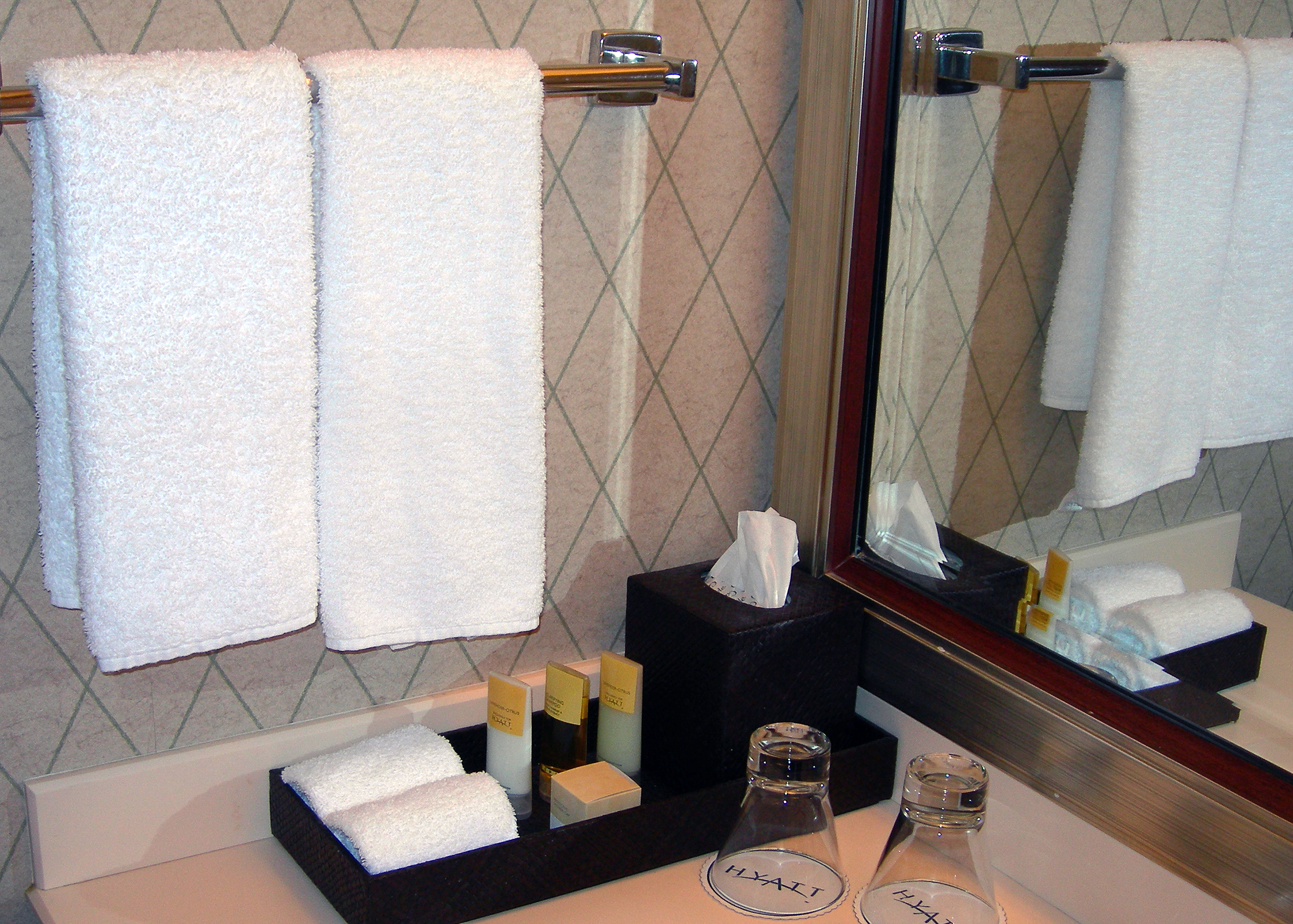 bathroom, towels, mirror, glasses, soaps and lotions