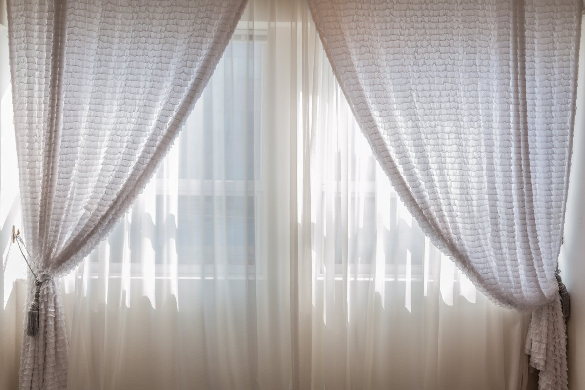 5 Winter Mistakes That Will Leave You Feeling Cold - Leaving Curtains Closed on Sunny Days