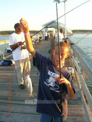 life in a house - jonathan and dad fishing