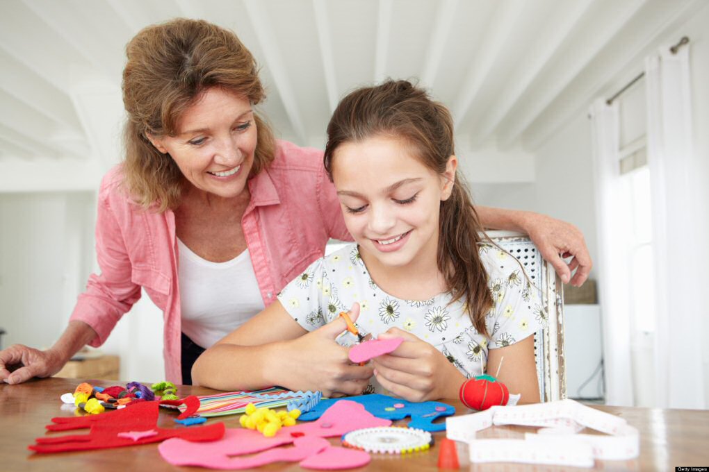 kid crafting with mom