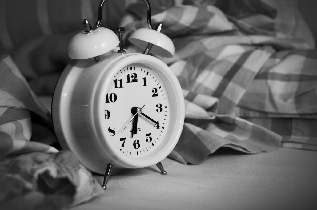 alarm clock on nightstand