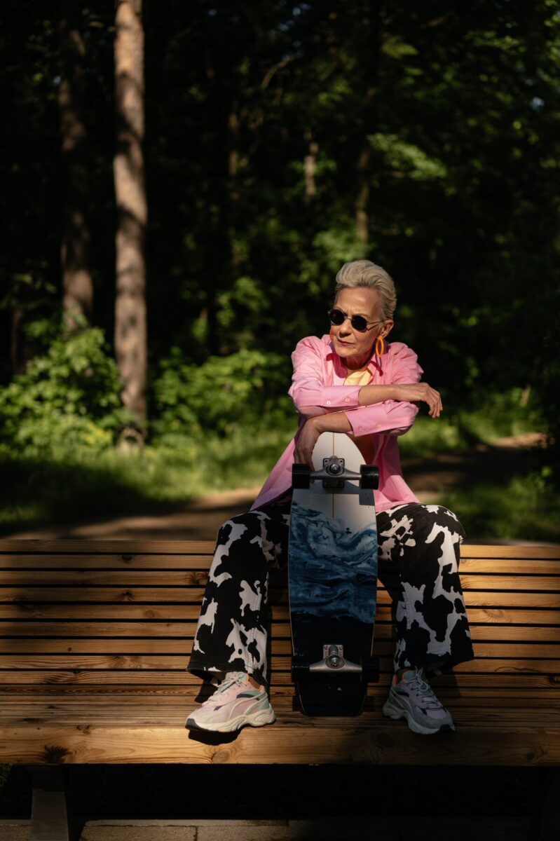 senior woman skateboarding