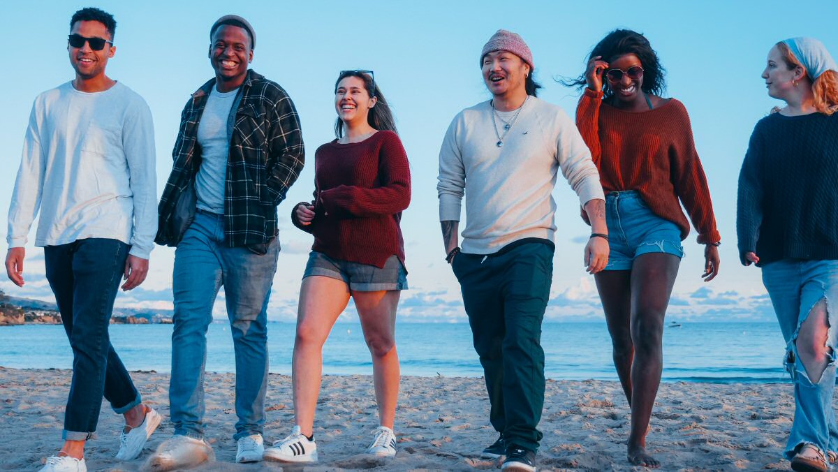 friends walking on beach